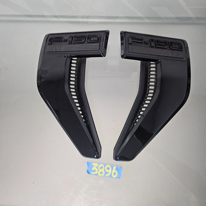 21-25 F150 XLT FENDER VENT BADGE LEFT RIGHT SET BLACK SPORT APPEARANCE #389610